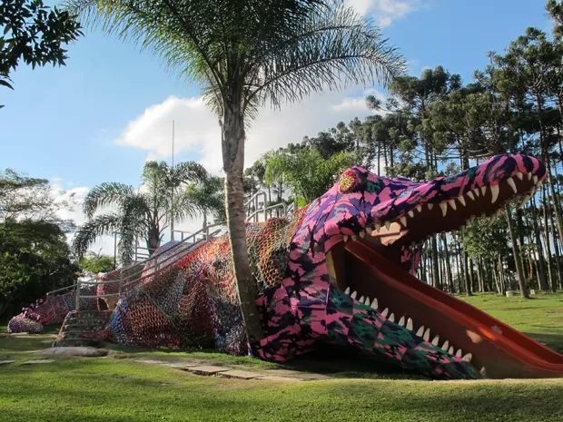 The crocodile slide repainted in vibrant colors