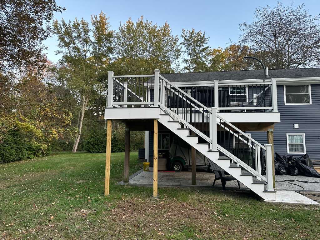 Newly built two-story deck on a New England home