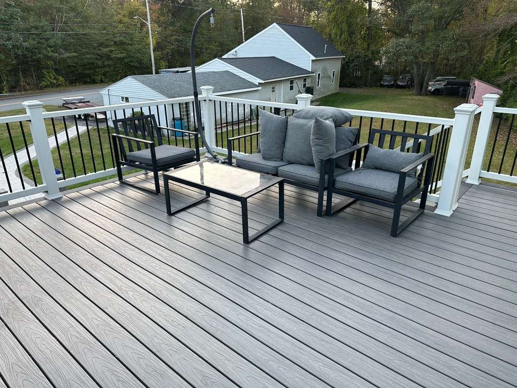 Composite gray deck with patio furniture